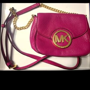 Michael kors pink leather mini crossbody purse with gold tone chain strap